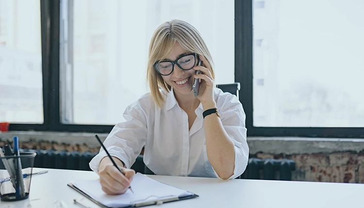 Small business owner comparing business phone lines options