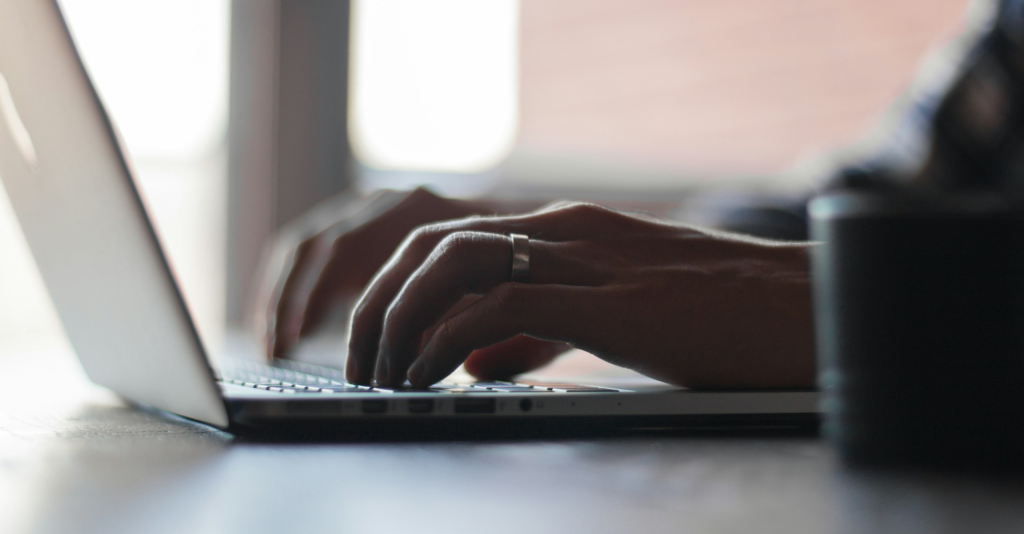 hands on a laptop
