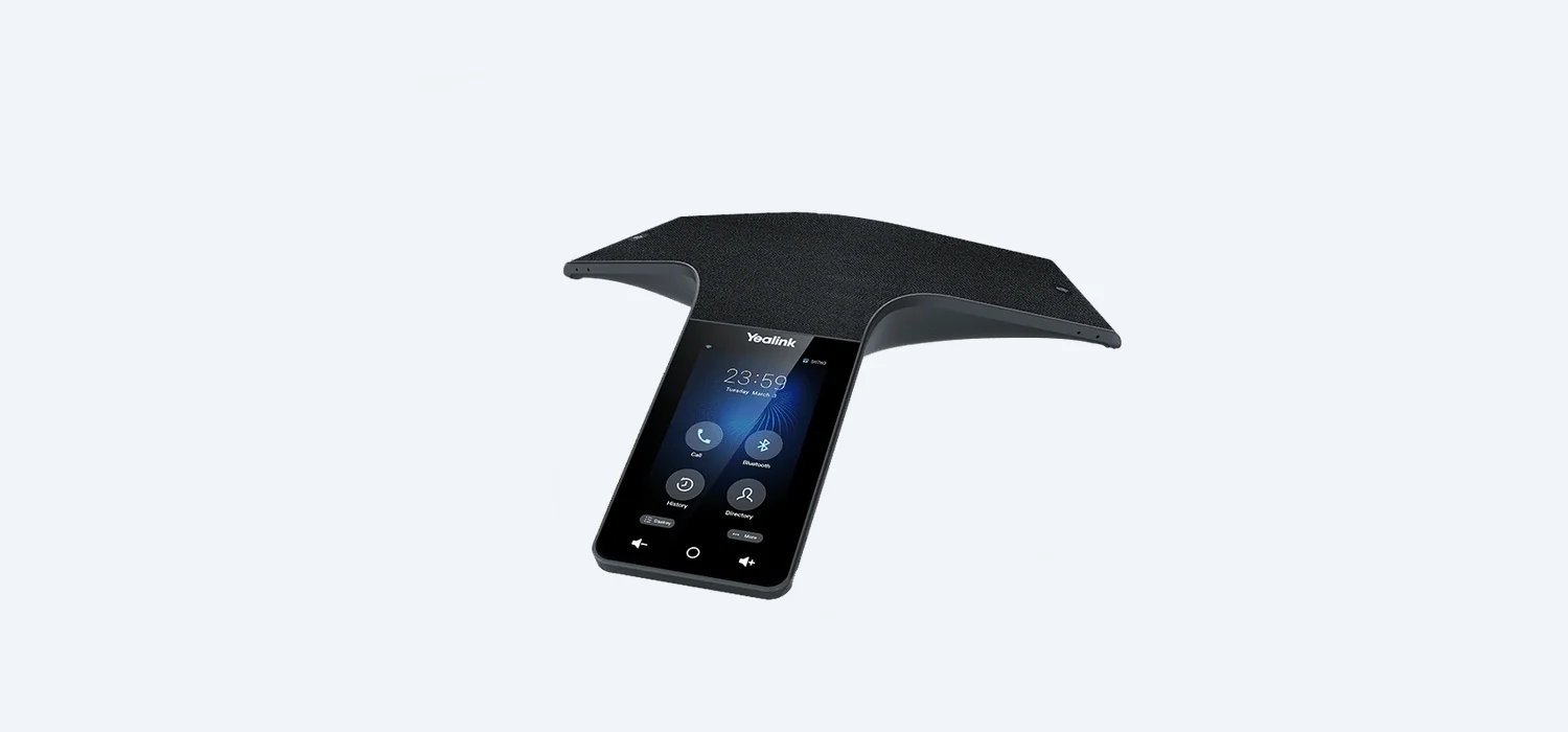 Yealink CP965 conference phone on a meeting-room table — ideal for small business conference calling